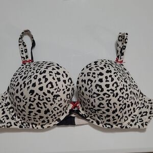 Cacique Black & White Leopard/Dalmatian Print Bra with Red Bow Accents size 46C